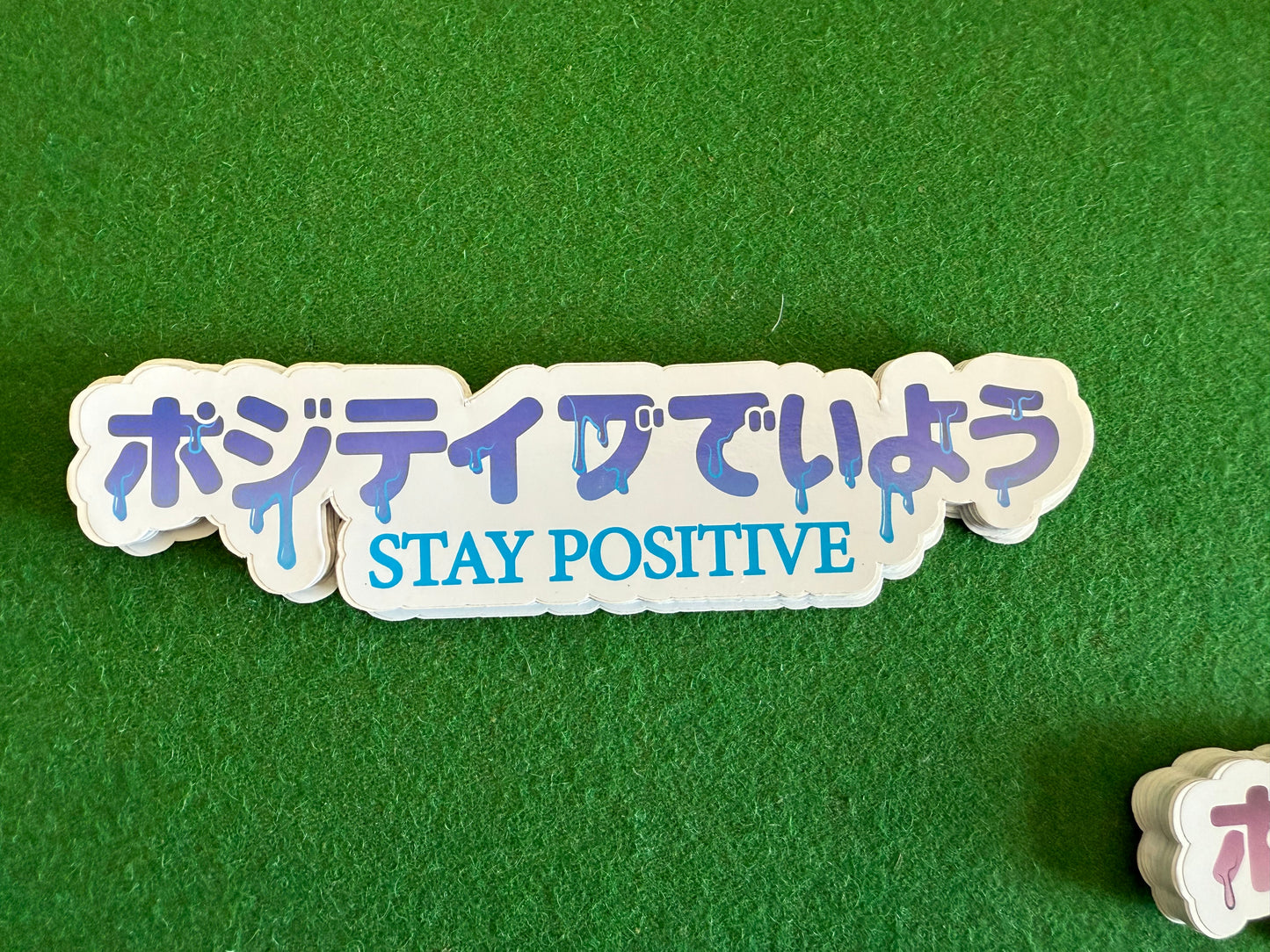 “Stay positive” sticker